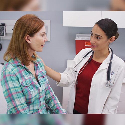 Doctor performing surgery with a team